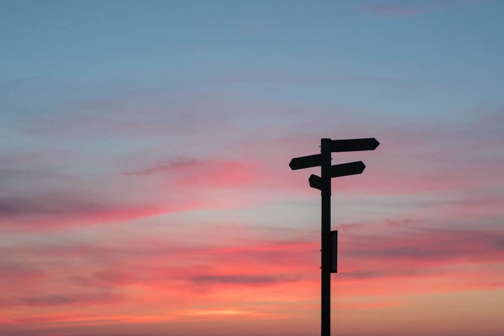 road sign sunset